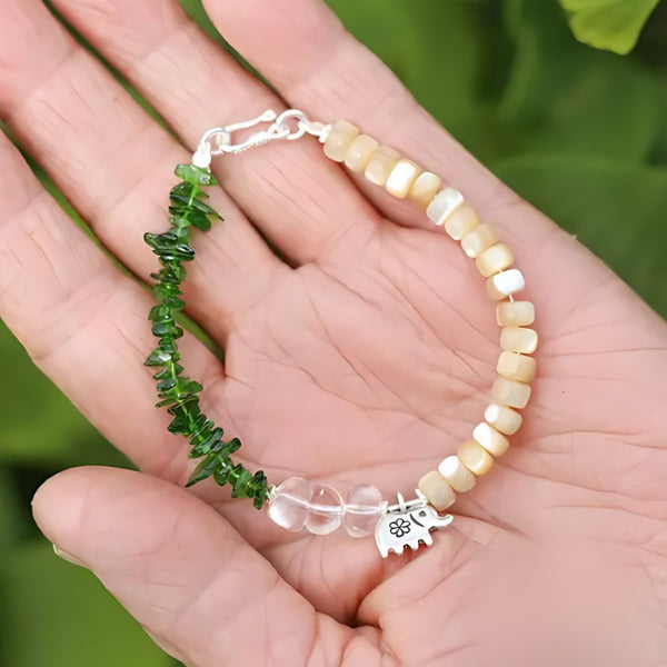 Elephant in the Ferns, handmade aventurine & jade, pearl and clear quartz bracelet worn on the hand