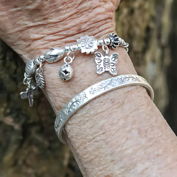 Heirloom Spring, handmade S925 silver bracelet worn on the hand