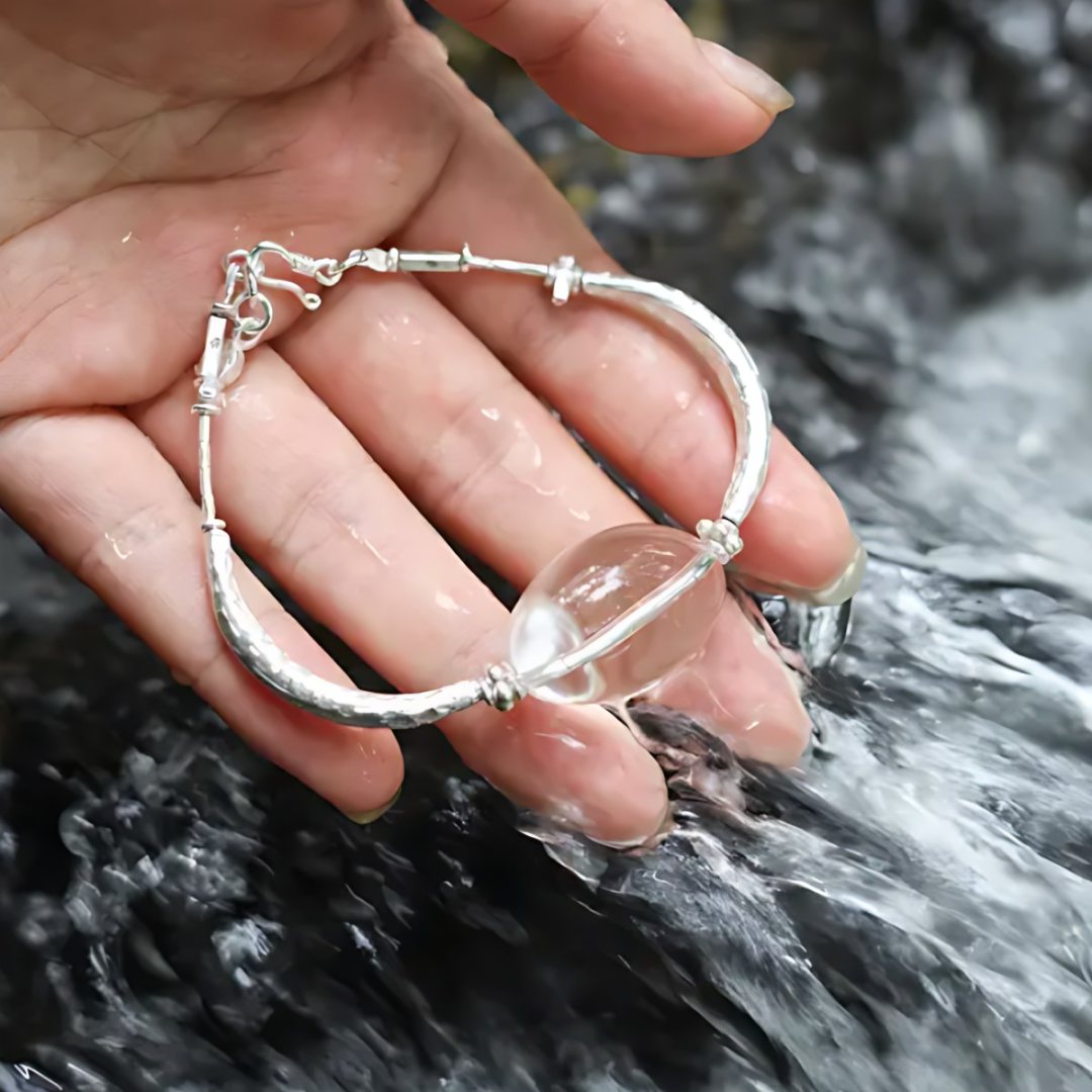 Mountain Stream Bangle, handmade clear quartz and S925 silver bracelet worn on the hand