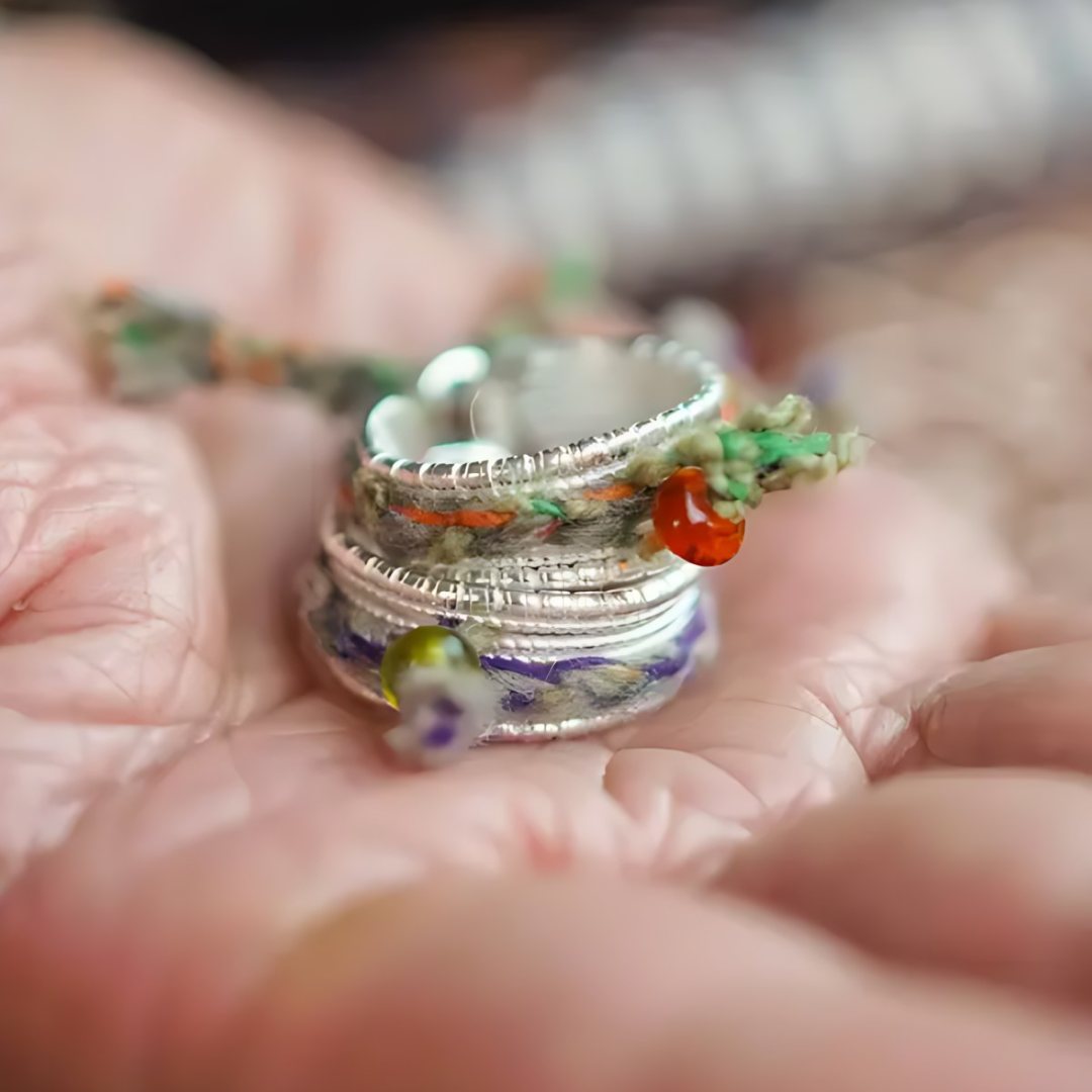 Nomad's Thread, handmade S925 silver and carnelian ring worn on the hand