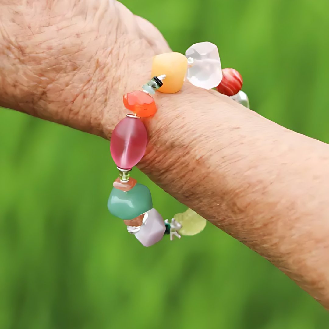 Orchard Bowl, handmade carnelian, aventurine & jade and clear quartz bracelet worn on the hand