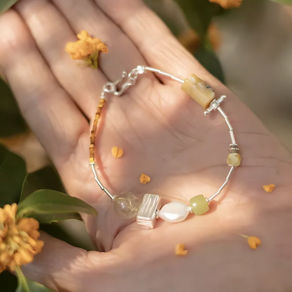 Osmanthus Night, handmade citrine, pearl and aventurine & jade bracelet worn on the hand