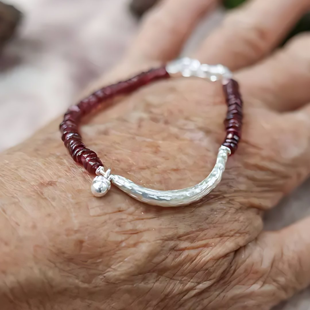 Pomegranate Seeds, handmade garnet and S925 silver bracelet worn on the hand