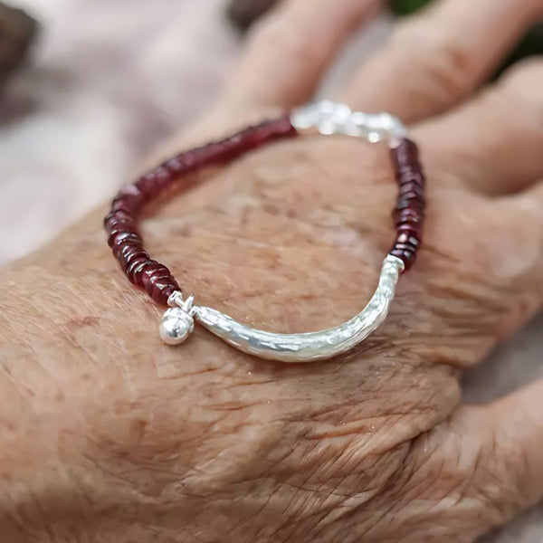 Pomegranate Seeds, handmade garnet and S925 silver bracelet worn on the hand