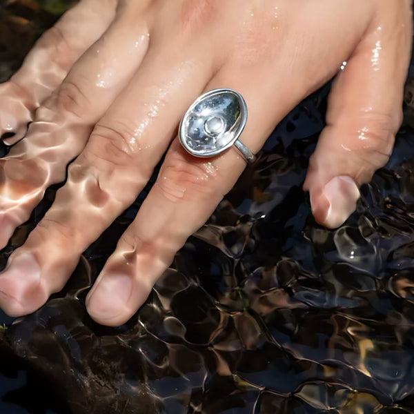 Spring Drop, handmade clear quartz and S925 silver ring worn on the hand