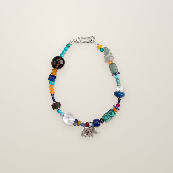 Star-Keeper Elephant, handmade turquoise, tiger's eye and carnelian bracelet, studio shot