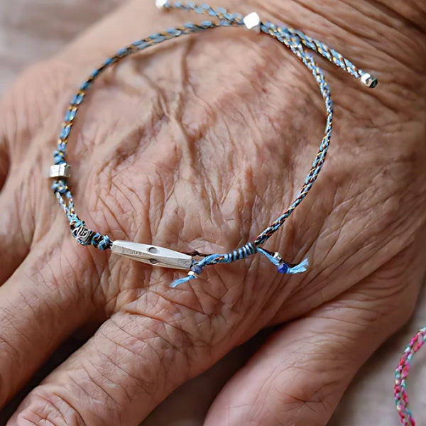 The Wishing Knot, handmade S925 silver cord bracelet worn on the hand