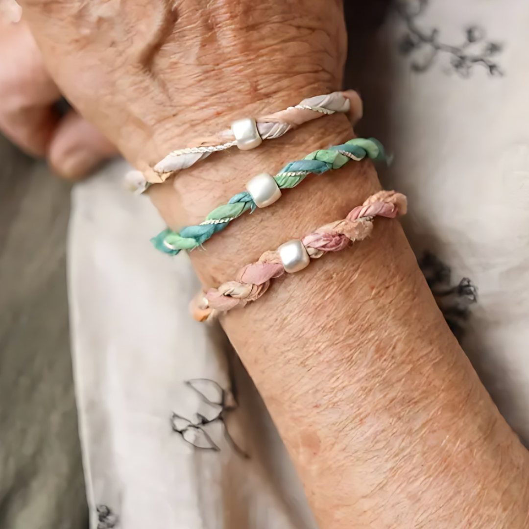 Three Whispers, handmade S925 silver cord bracelet worn on the hand