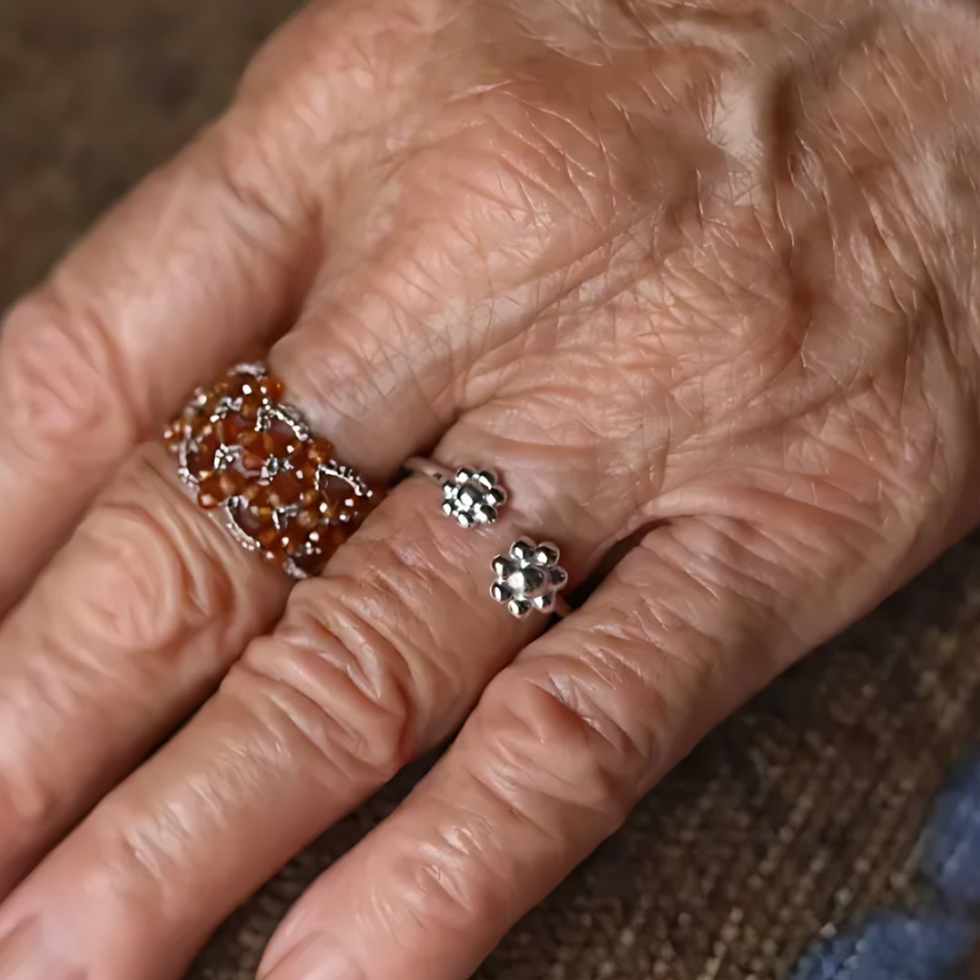 Two Flowers Meeting, handmade garnet and S925 silver ring worn on the hand