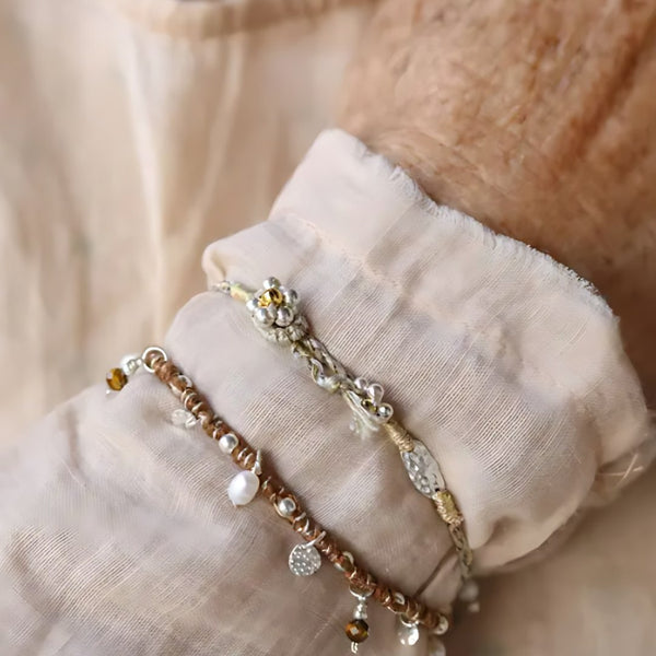 Wind-Chime Braid, handmade pearl, tiger's eye and S925 silver cord bracelet worn on the hand